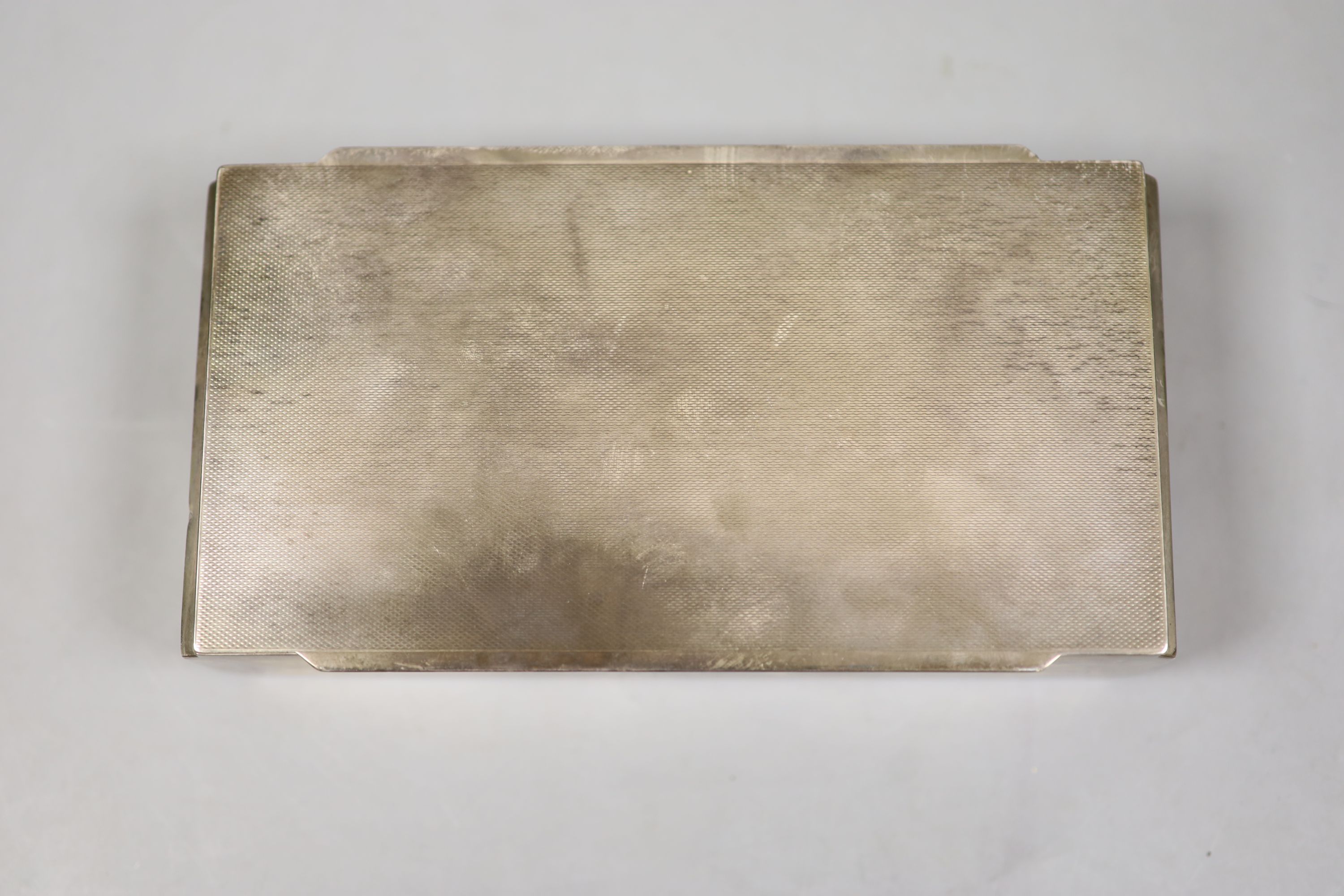 A George VI Art Deco engine turned silver cigarette case, by Walker & Hall, Chester, 1939